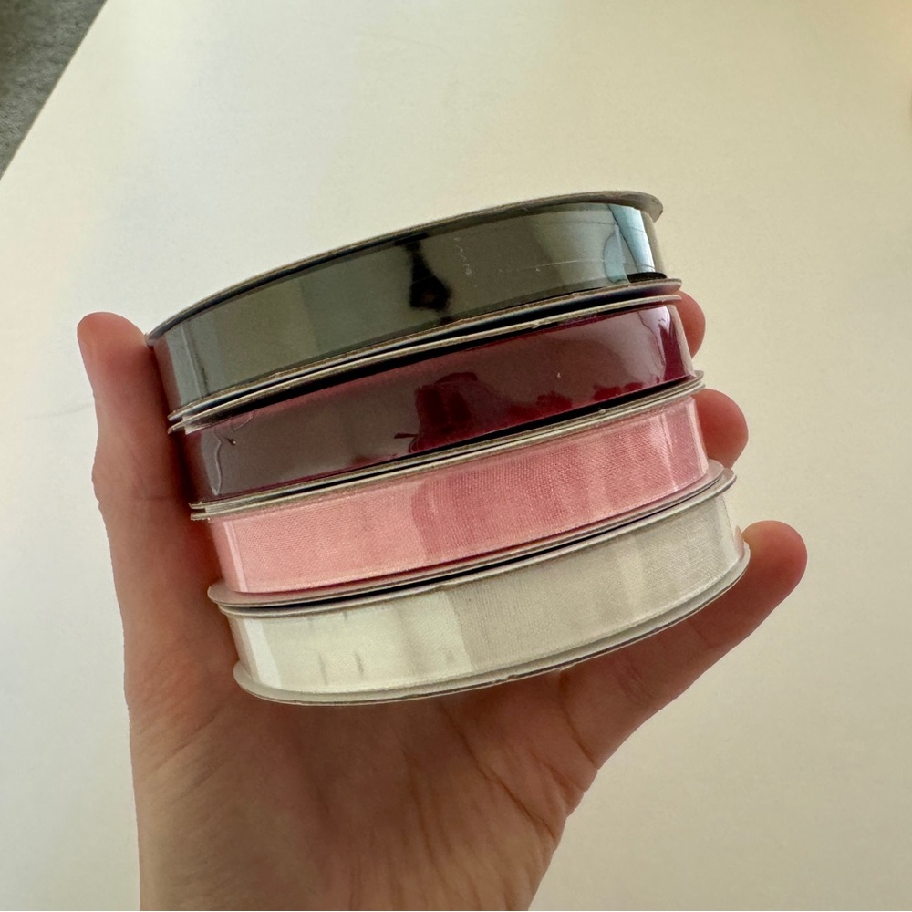 Assorted ribbons, black velvet ribbon, burgundy velvet ribbon, pink ribbon